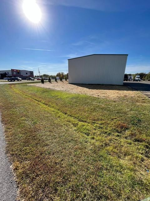 Sunny day with white building - Campbellsburg, IN | Twisted Electric LLC 