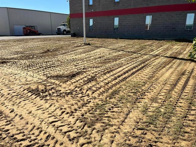 Large concrete building with a lot of dirt in front of it - Campbellsburg, IN | Twisted Electric LLC 