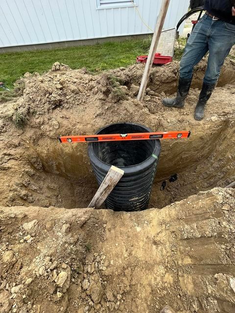 Man measuring hole - Campbellsburg, IN | Twisted Electric LLC 