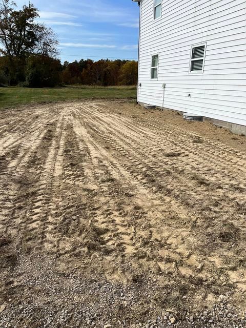 Dirt with trail tracks beside house - Campbellsburg, IN | Twisted Electric LLC 