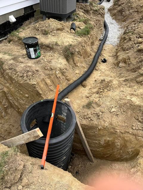 Drain pipe installation in a trench next to a house - Campbellsburg, IN | Twisted Electric LLC 