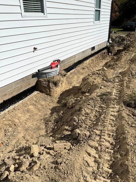 Large pile of dirt in front of a white house - Campbellsburg, IN | Twisted Electric LLC 