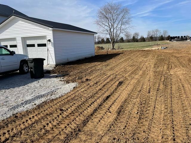 White truck parked in the dirt in front of a garage - Campbellsburg, IN | Twisted Electric LLC 