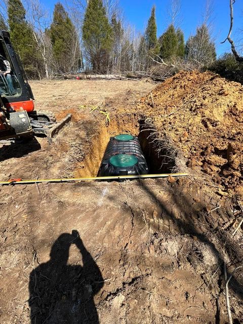 Septic tank being installed in a hole in the ground - Campbellsburg, IN | Twisted Electric LLC 