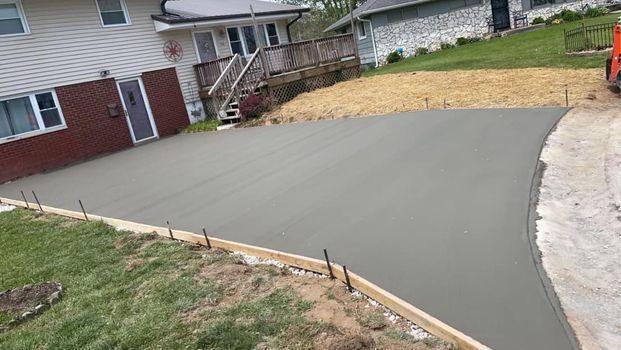 Concrete driveway being built in front of a house - Campbellsburg, IN | Twisted Electric LLC 