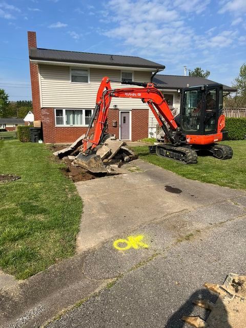 Yellow and black striped sign on the side of the road - Campbellsburg, IN | Twisted Electric LLC 