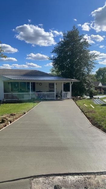 Concrete driveway being built in front of a house - Campbellsburg, IN | Twisted Electric LLC 