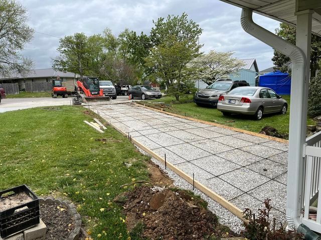 Concrete driveway being built in front of a house - Campbellsburg, IN | Twisted Electric LLC 