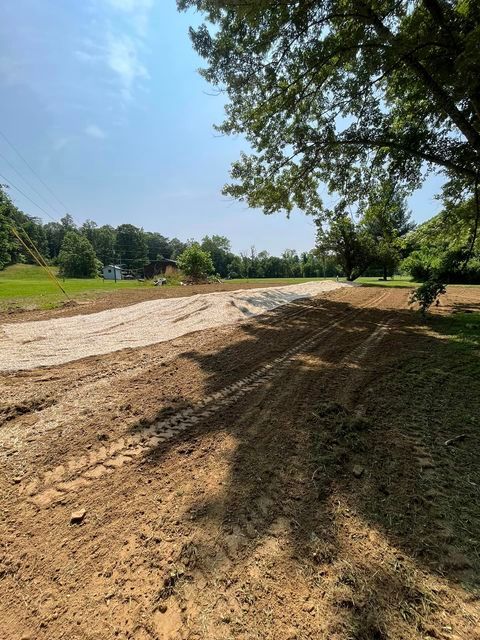 Dirt road being built in the middle of a field - Campbellsburg, IN | Twisted Electric LLC 