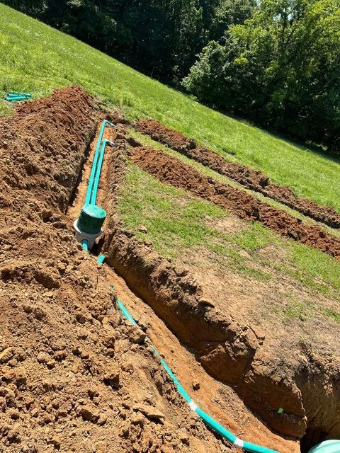 Piping system being installed in a yard - Campbellsburg, IN | Twisted Electric LLC 