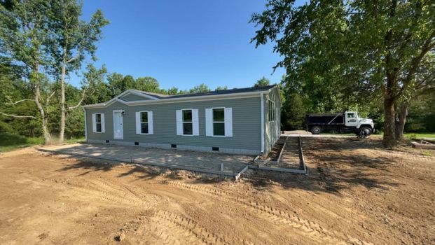 Mobile home being built in the middle of a dirt field - Campbellsburg, IN | Twisted Electric LLC 