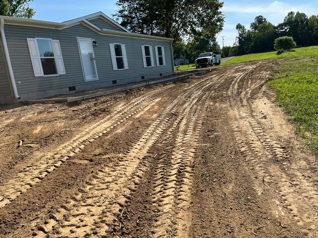Truck parked on the side of a dirt road in front of a house - Campbellsburg, IN | Twisted Electric LLC 