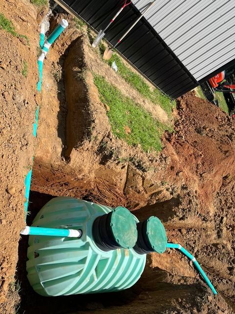 Septic tank being installed in a hole in the ground - Campbellsburg, IN | Twisted Electric LLC 