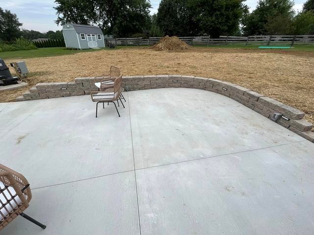 Patio with a grill and a house in the background - Campbellsburg, IN | Twisted Electric LLC 