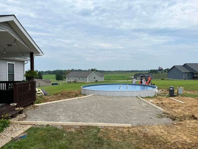 Swimming pool being built in the backyard of a house - Campbellsburg, IN | Twisted Electric LLC 
