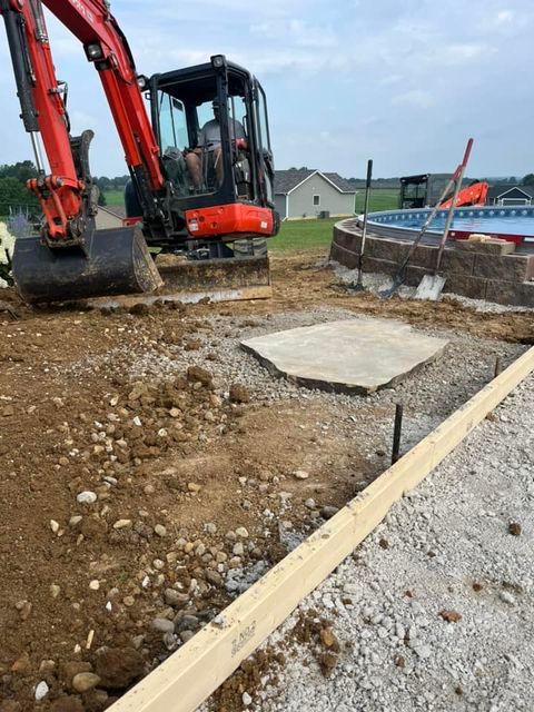 Driving an excavator on a construction site - Campbellsburg, IN | Twisted Electric LLC 