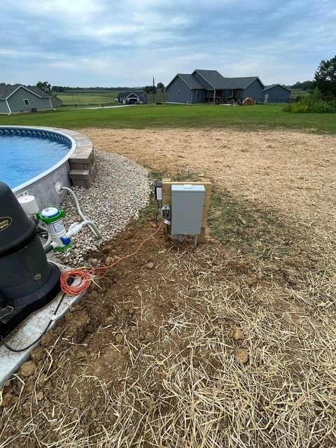 Swimming pool being built in the backyard of a house - Campbellsburg, IN | Twisted Electric LLC 