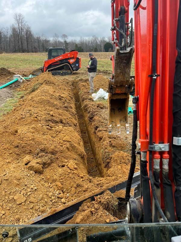 Trench Next To An Excavator — Campbellsburg, IN — Twisted Electric LLC