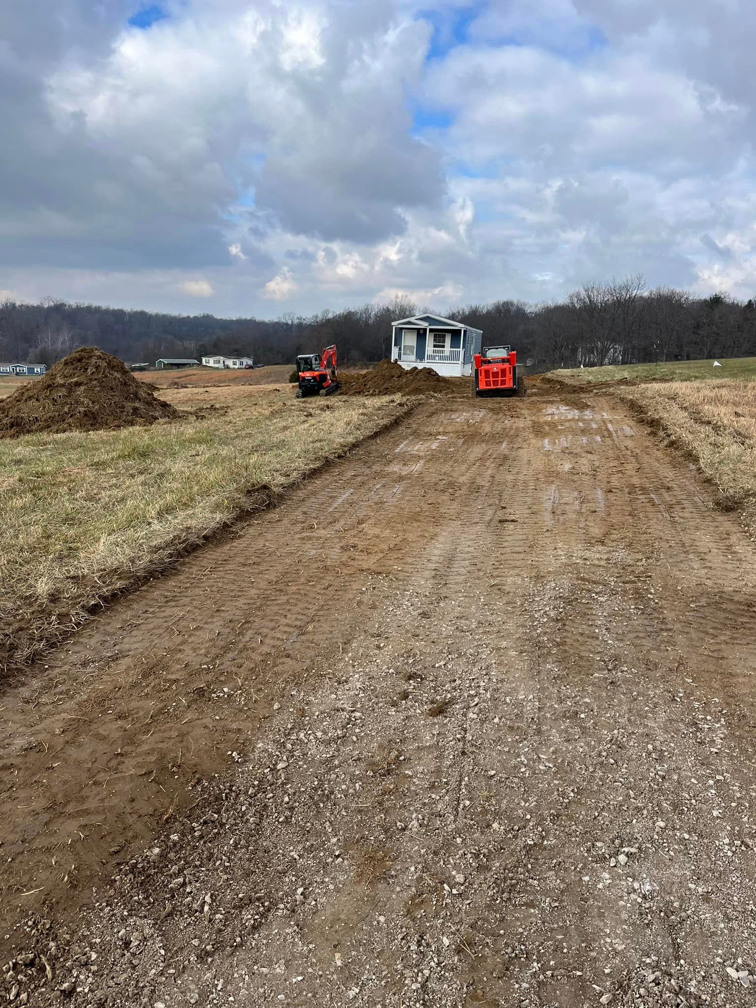 Dirt Road With A Tractor And A House In The Background — Campbellsburg, IN — Twisted Electric LLC