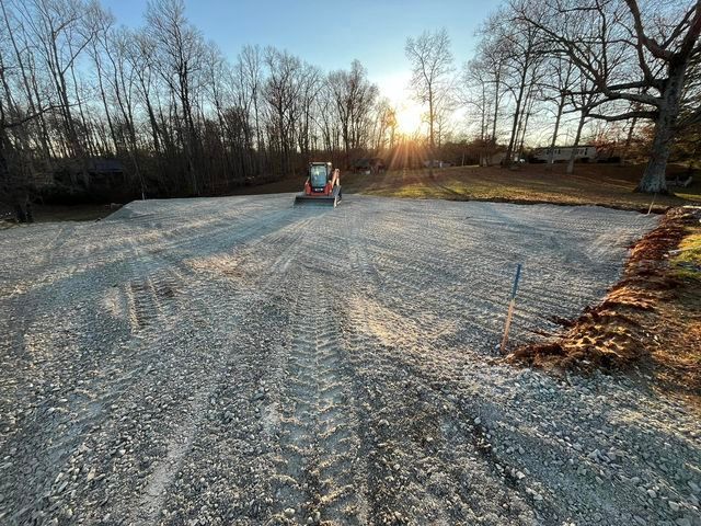 Bulldozer driving down a gravel road - Campbellsburg, IN | Twisted Electric LLC 