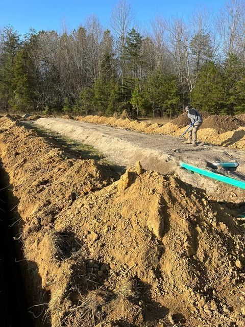 Man digging a hole in the dirt with a shovel - Campbellsburg, IN | Twisted Electric LLC 