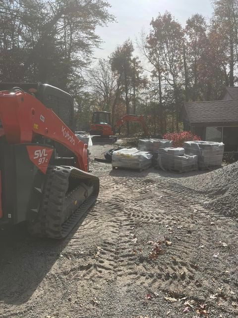 Kubota skid steer is parked in a dirt lot - Campbellsburg, IN | Twisted Electric LLC 