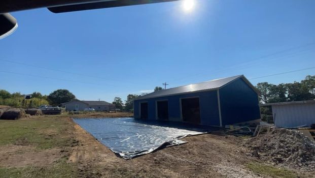 Blue barn sitting in the middle of a dirt field - Campbellsburg, IN | Twisted Electric LLC 