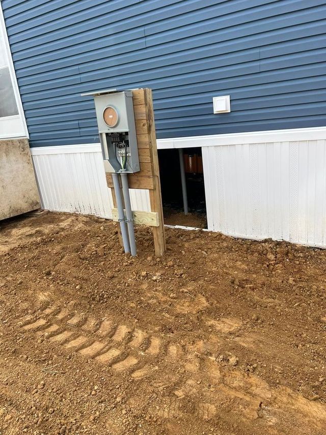 A Blue and White House with A Hole in The Ground — Campbellsburg, IN — Twisted Electric LLC