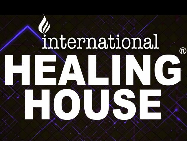 Logo for International Healing House: white text on a dark background, flame symbol.