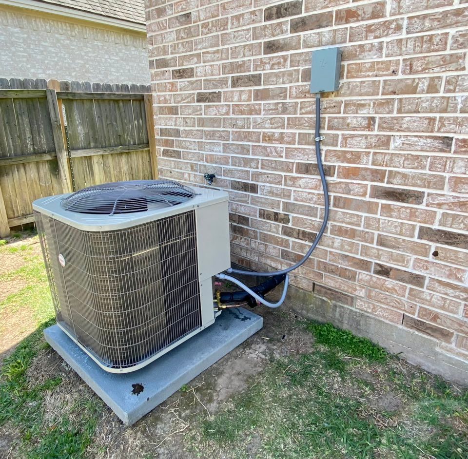 A man is working on a kitchen in a house under construction