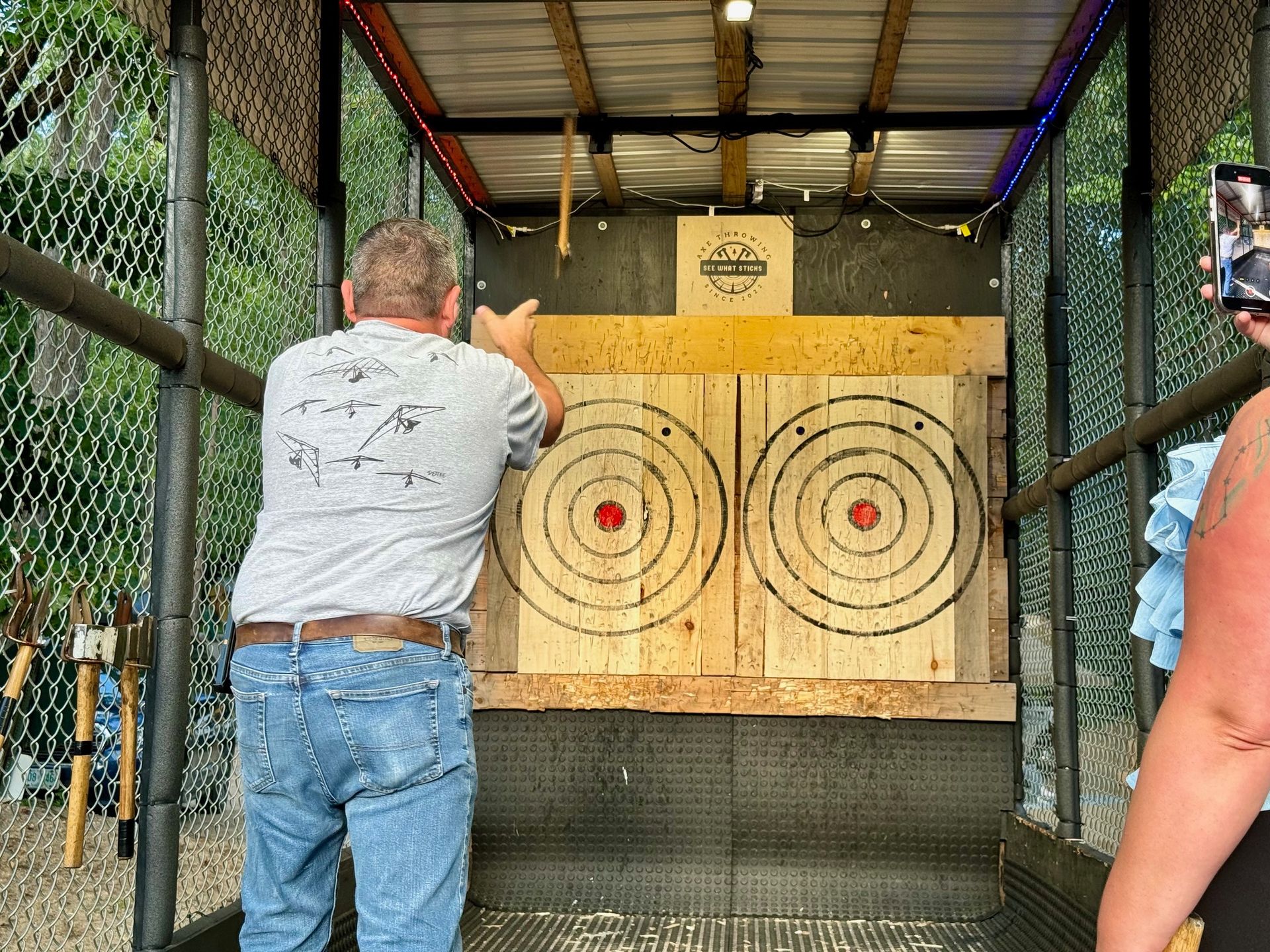 A person aims at a target