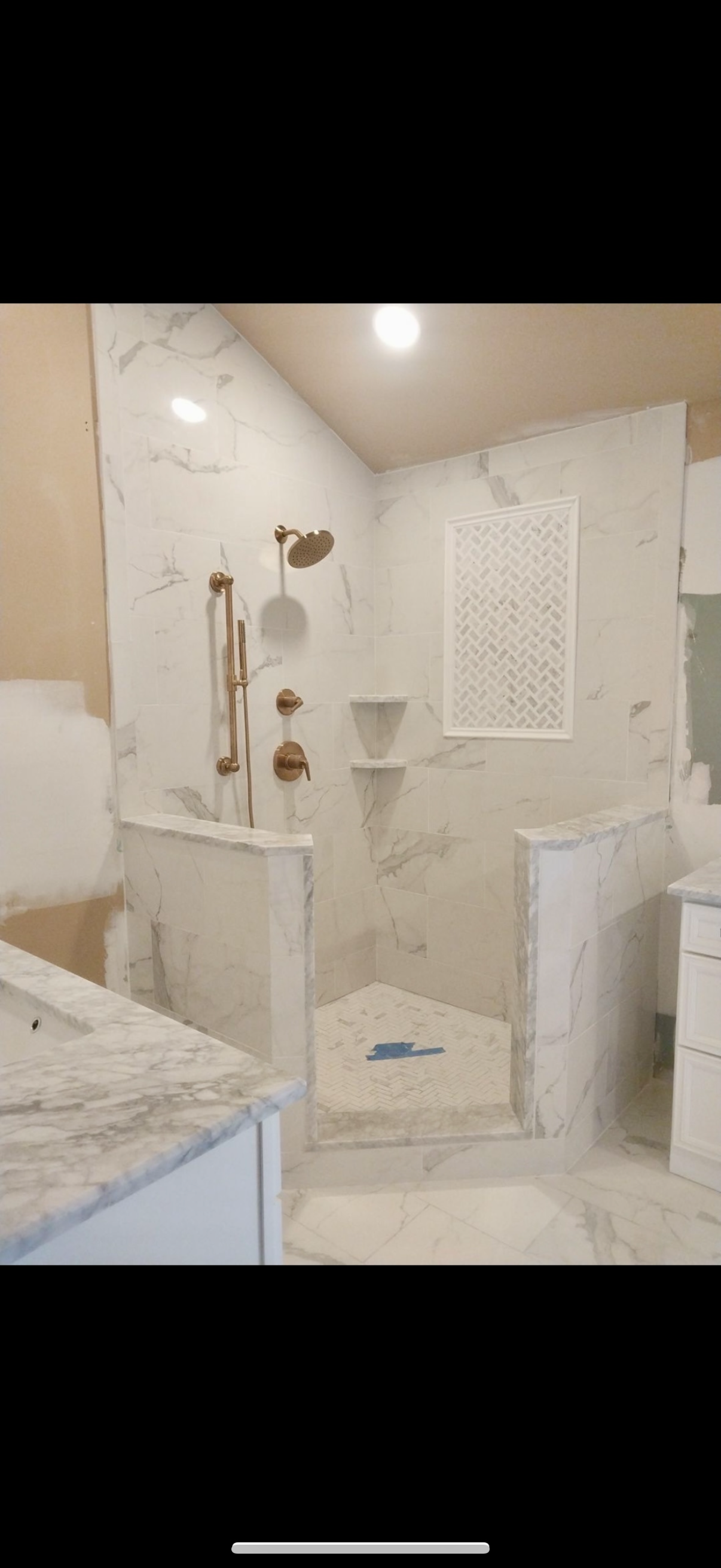 A remodeled bathroom with new tiles, a walk-in shower, and a sink in Old Bridge, NJ.