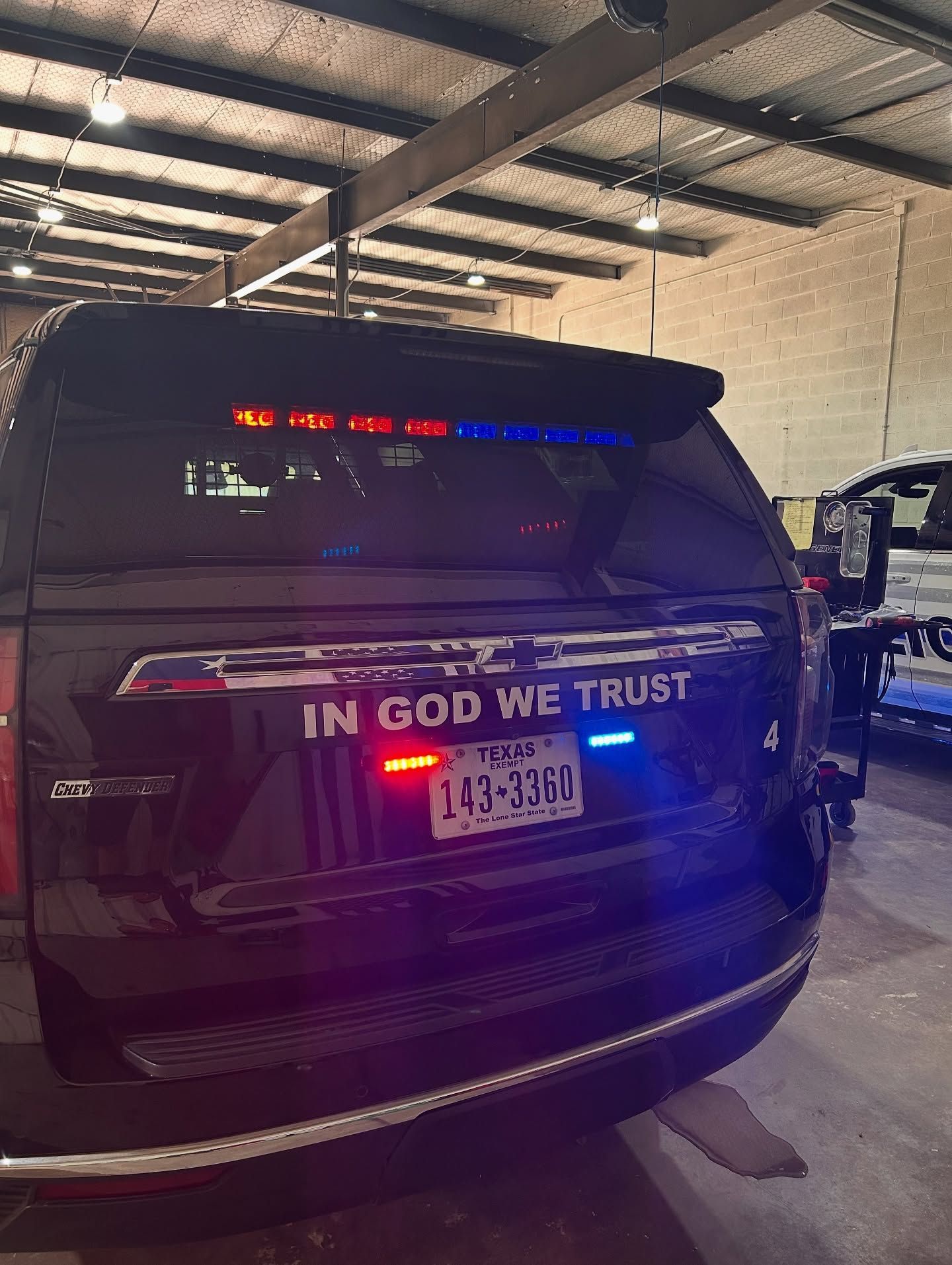 Rear view of a black SUV with 