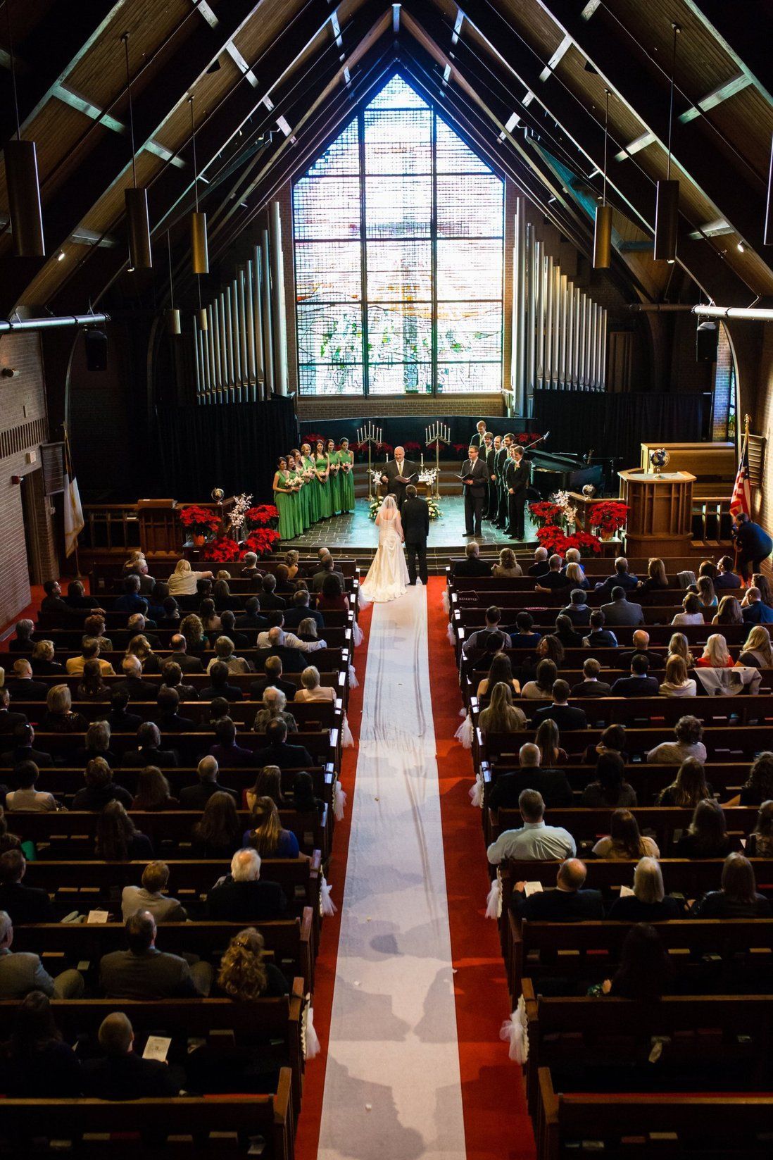 A bride and groom are getting married in a church