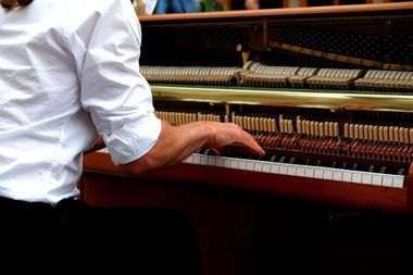 Man Tuning the Piano — Piano Tuner in Taree, NSW