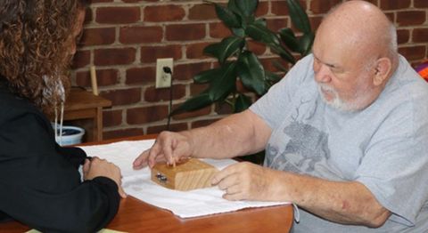 Elder During Hand Rehabilitation — Oakland, MD — Garrett Orthopedic Physical Therapy & Rehabilitation