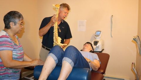 Man Showing Spine Structure to Patient — Oakland, MD — Garrett Orthopedic Physical Therapy & Rehabilitation