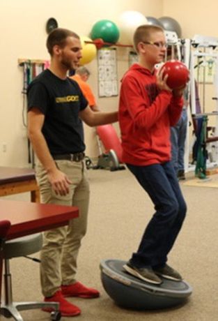 Teaching Child During Fitness Activity — Oakland, MD — Garrett Orthopedic Physical Therapy & Rehabilitation