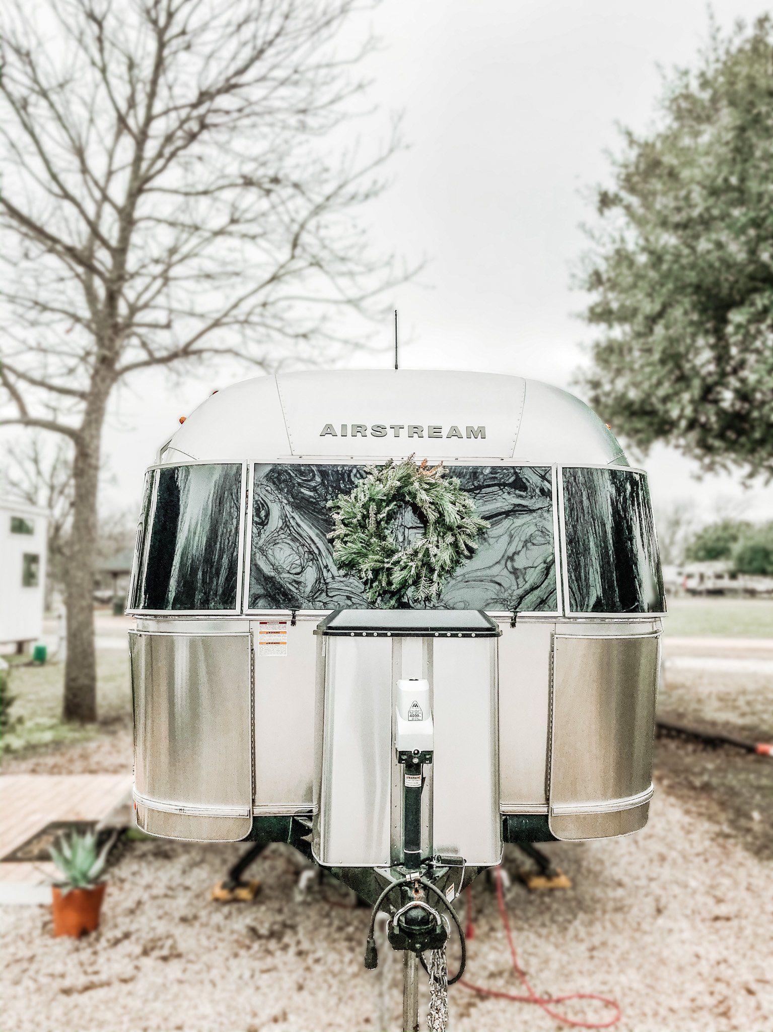 Airstream decorated for Christmas with holiday wreath