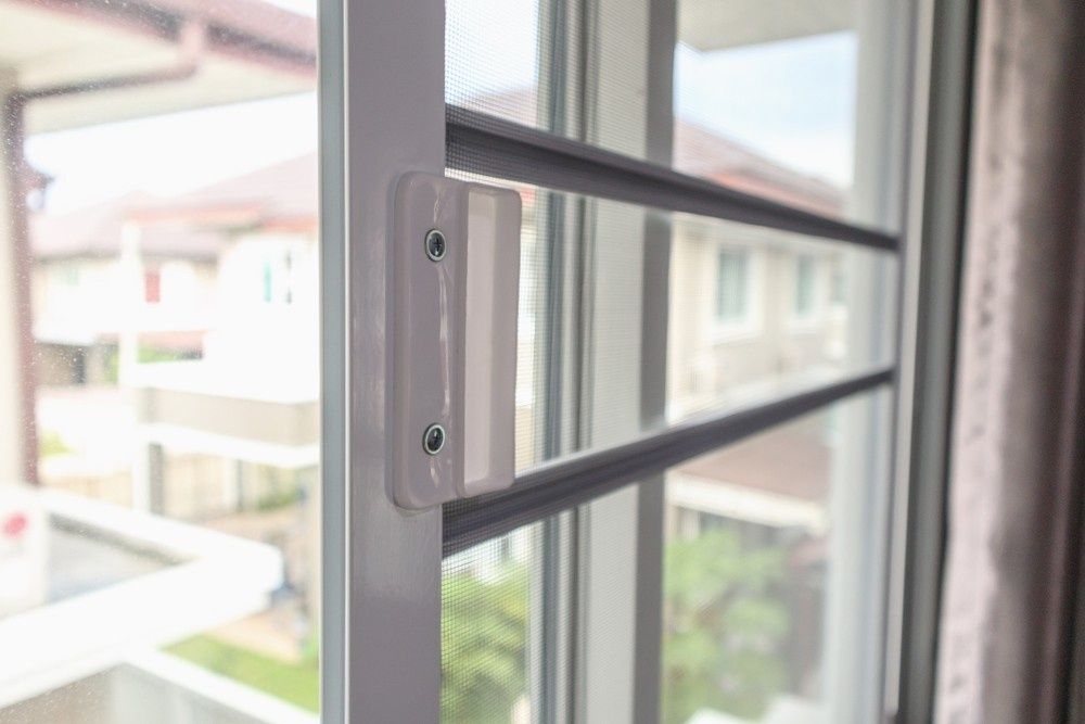 A Close Up Of A Sliding Glass Door In A House — Northern Glazing Glass & Aluminium In Smithfield, QLD