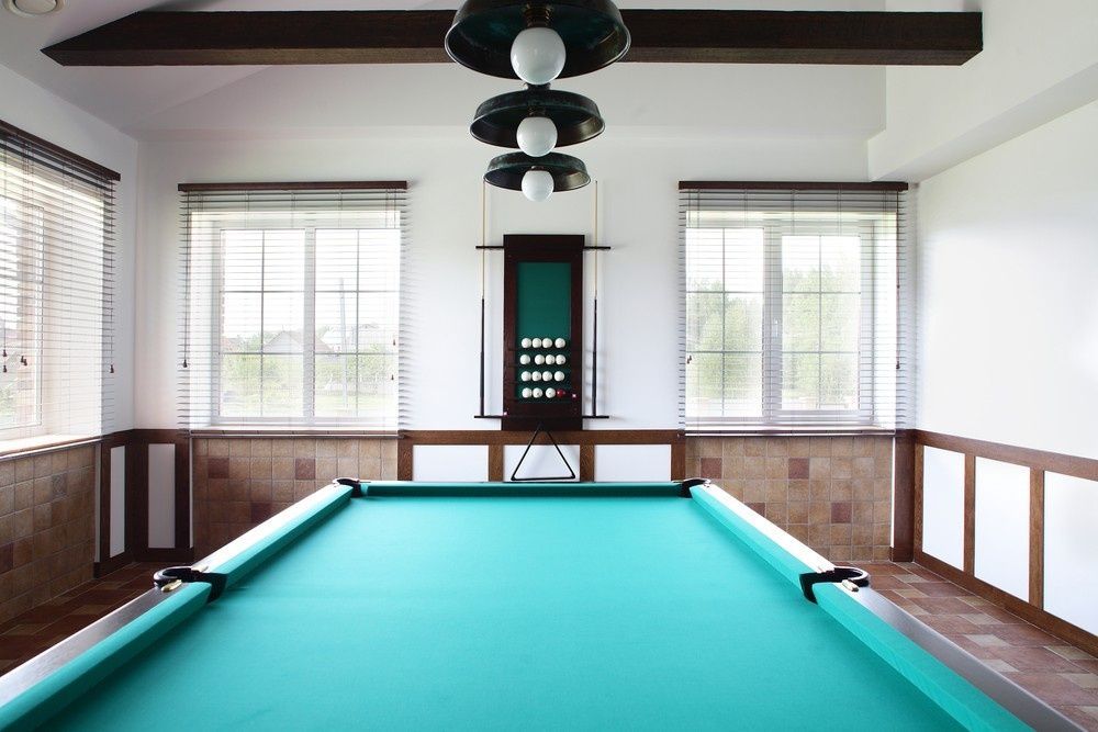 A Pool Table In A Room With A Lot Of Windows — Northern Glazing Glass & Aluminium In Smithfield, QLD