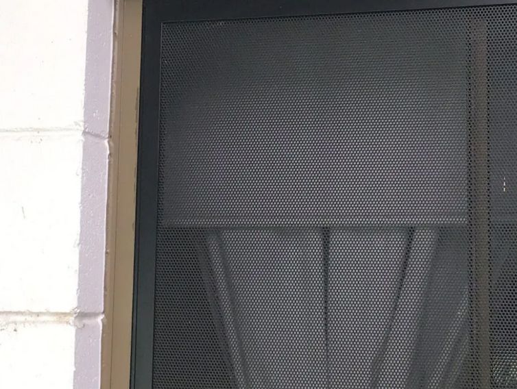 Curtains on Windows with Security Screens