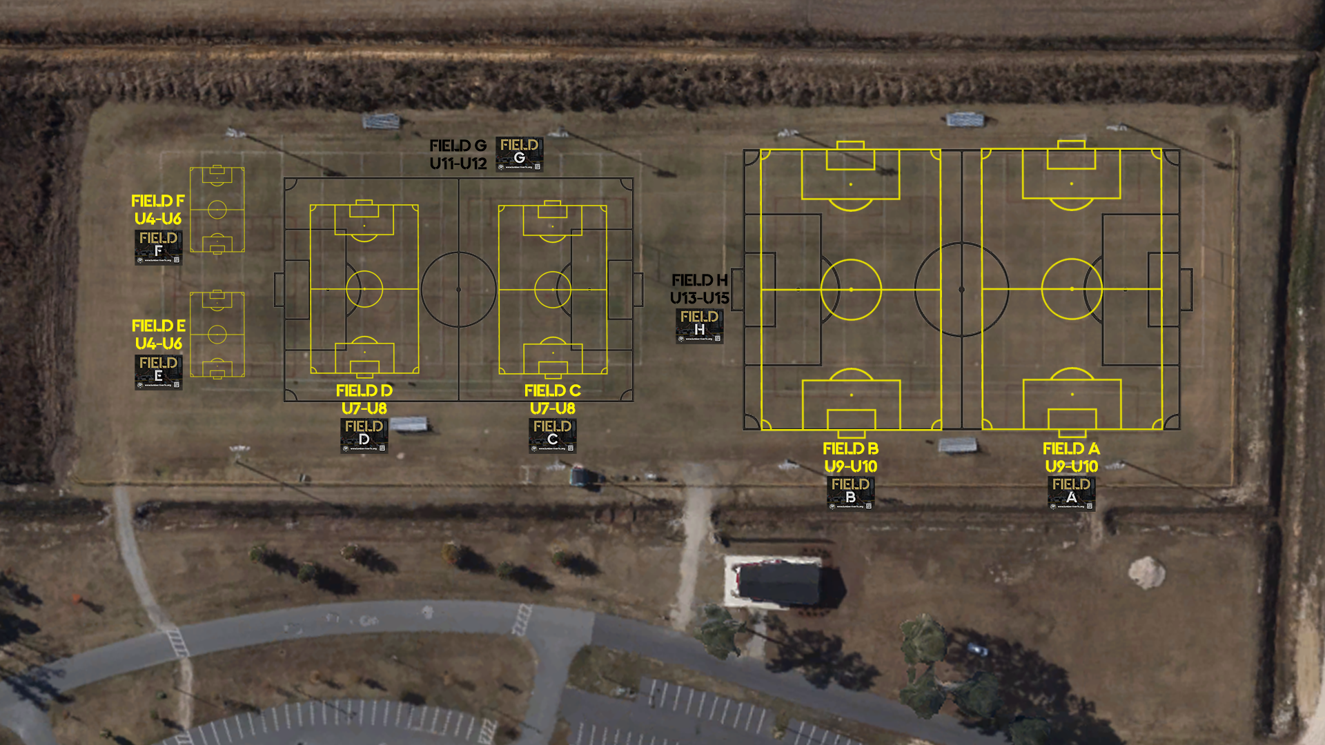 An aerial view of a field with a lot of fields and trees.