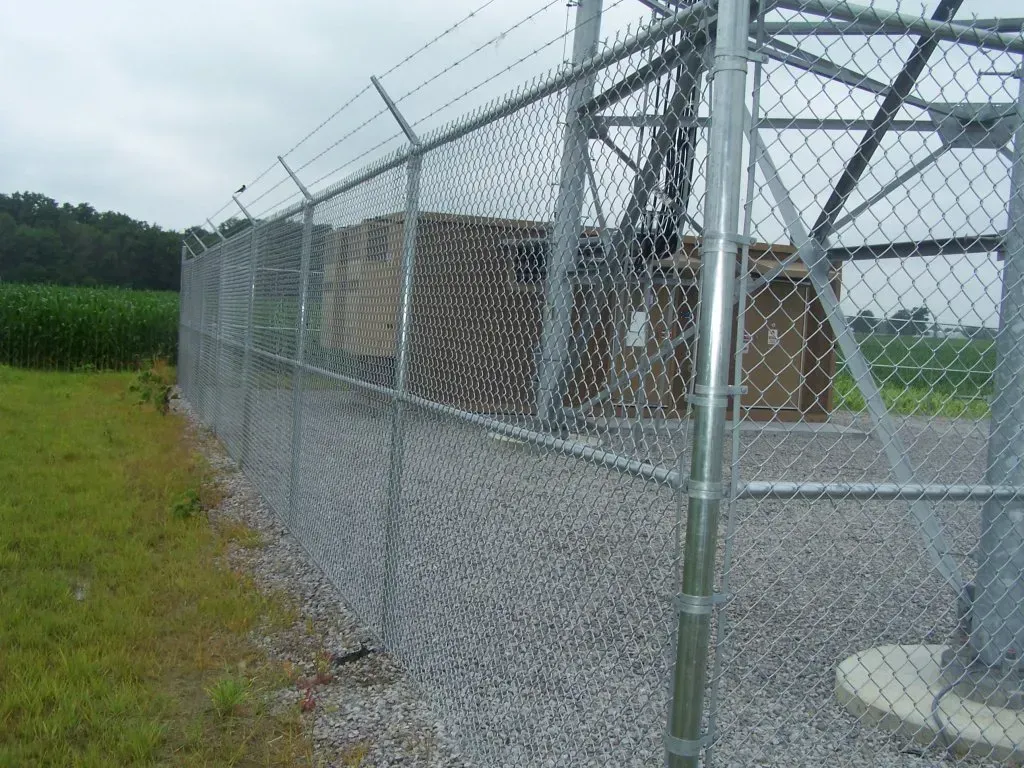 Side View of Chain Link Fence with Barbed Wire — Springfield, OH — Springfield Fence Company