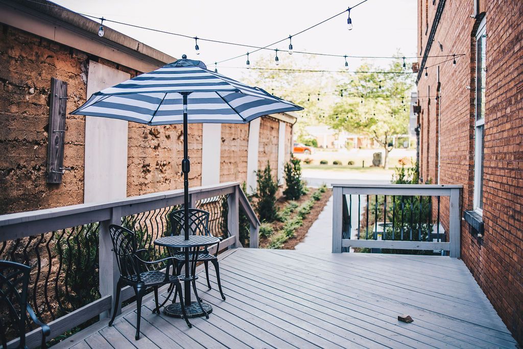 Outdoor wedding reception space in the Alley Garden at The R.F. Strickland Co. venue.