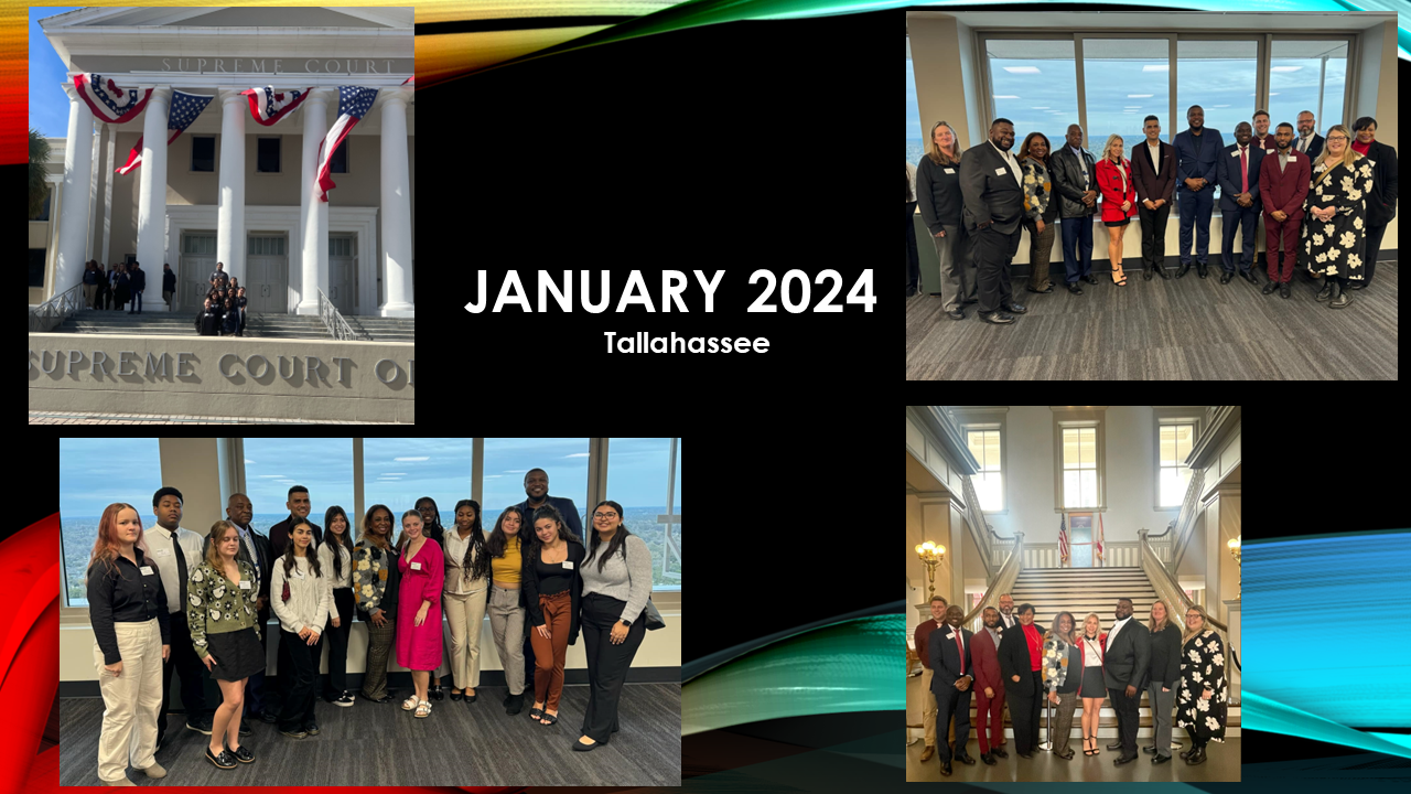 A group of people are posing for a picture in front of a building.