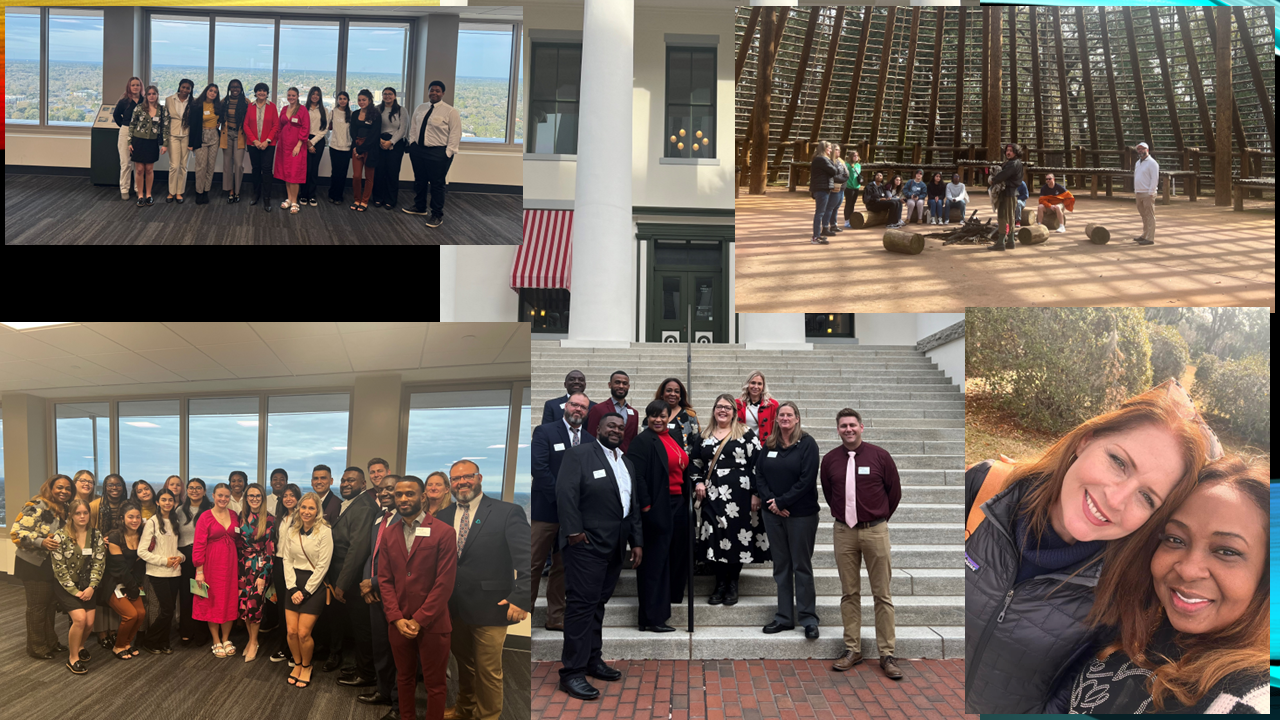 A group of people are posing for a picture in front of a building.