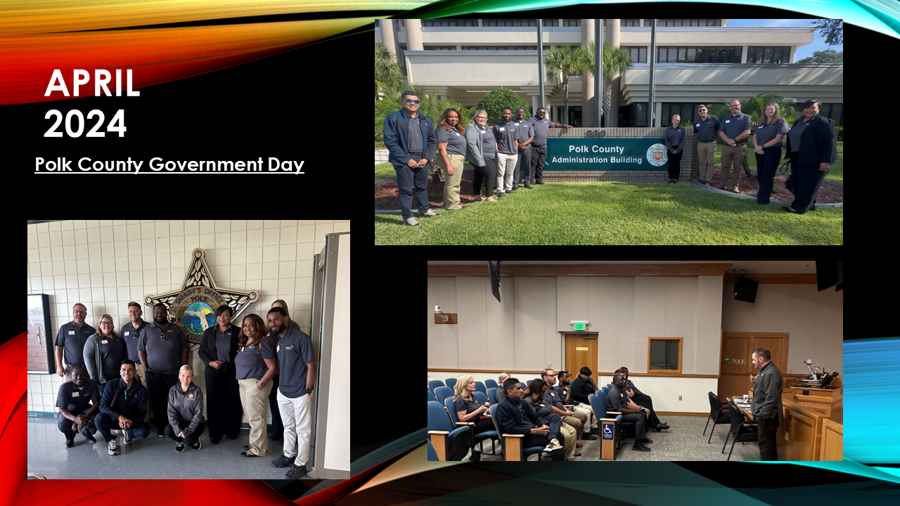 A group of people are posing for a picture in front of a building.