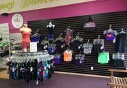 A store filled with lots of clothes and bags