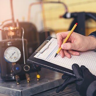 Man Holding a Pen — Commercial Service Specialist Panama City FL in Panama City, FL